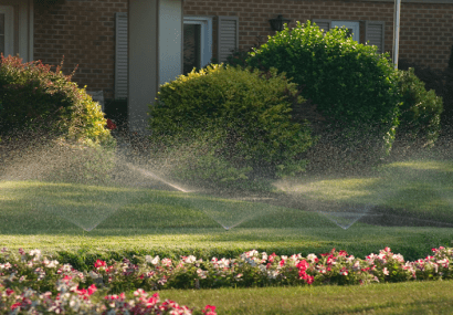 Lawn irrigation watering grass and flowers
